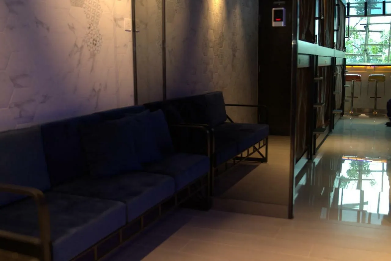 Hotel Snooze Hongkong Kapslový hotel